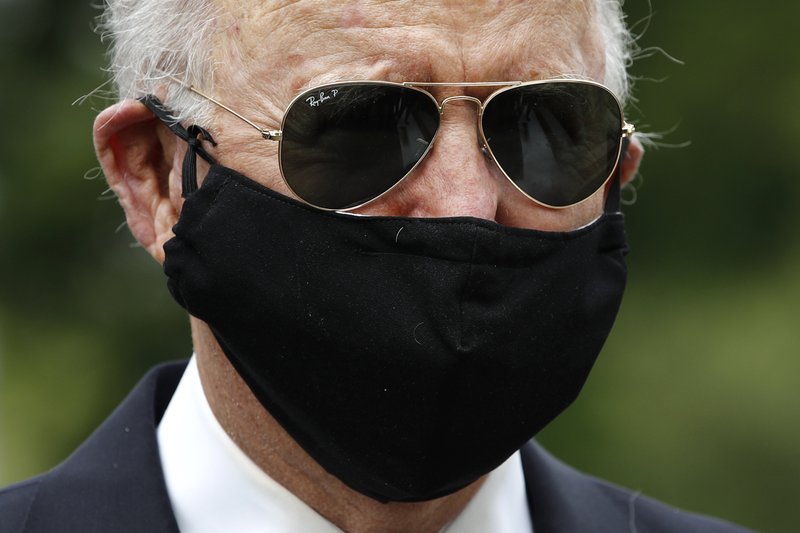 Biden knocks Trump for 'this macho stuff' in shunning masks