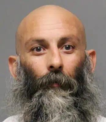 FILE - This undated booking photo provided by the Delaware Department of Justice shows Barry Croft Jr. Prosecutors are recommending a life prison sentence for the co-leader of the conspiracy to kidnap Michigan’s governor. They have reminded a judge that social media posts and secretly recorded conversations revealed a chilling desire by Croft Jr. to spark a “reign of terror” in 2020. Croft Jr. is due in federal court Wednesday, Dec. 28, 2022, a day after key ally Adam Fox was sentenced to 16 years in prison after prosecutors also recommended a life sentence for him. (Delaware Department of Justice via AP, File)