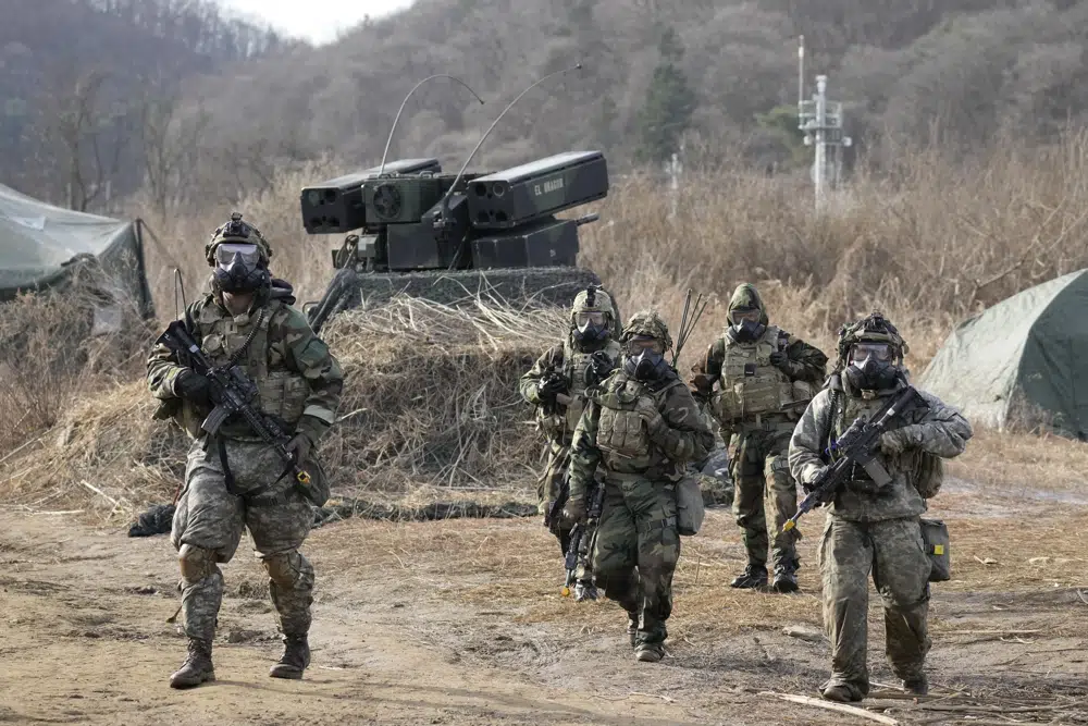 U.S. soldiers participate in a joint military drill between South Korea and the United States in Paju, South Korea, Thursday, March 16, 2023. North Korea test-launched an intercontinental ballistic missile Thursday just hours before the leaders of South Korea and Japan were to meet at a Tokyo summit expected to be overshadowed by North Korean nuclear threats. The North's first ICBM test in a month and third weapons tests this week also comes as South Korean and U.S. troops continue joint military exercises that Pyongyang considers a rehearsal to invade. (AP Photo/Lee Jin-man)