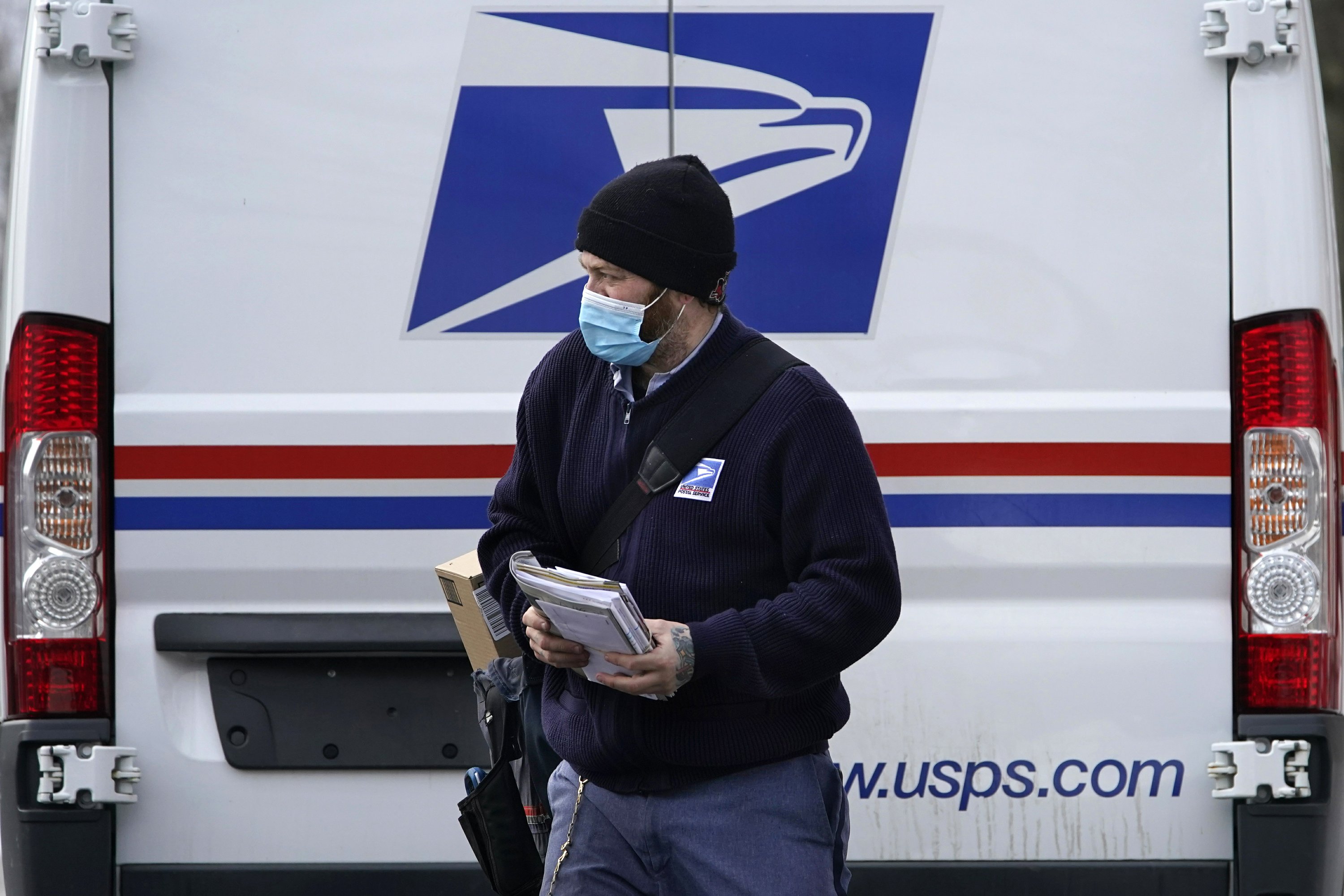 Tired postal workers expect Biden to bring a new tone, change