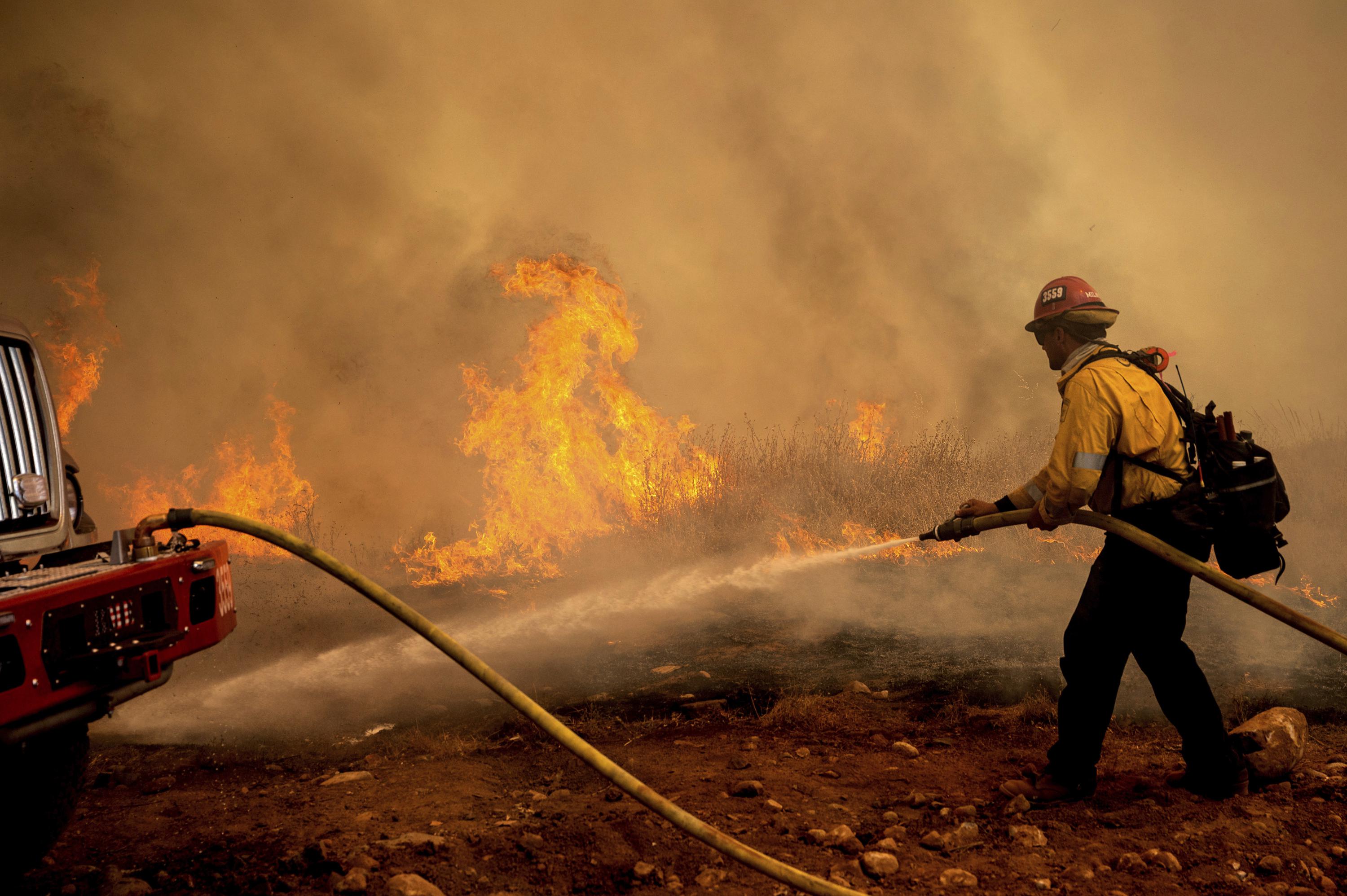 New evacuations for communities near California forest fire