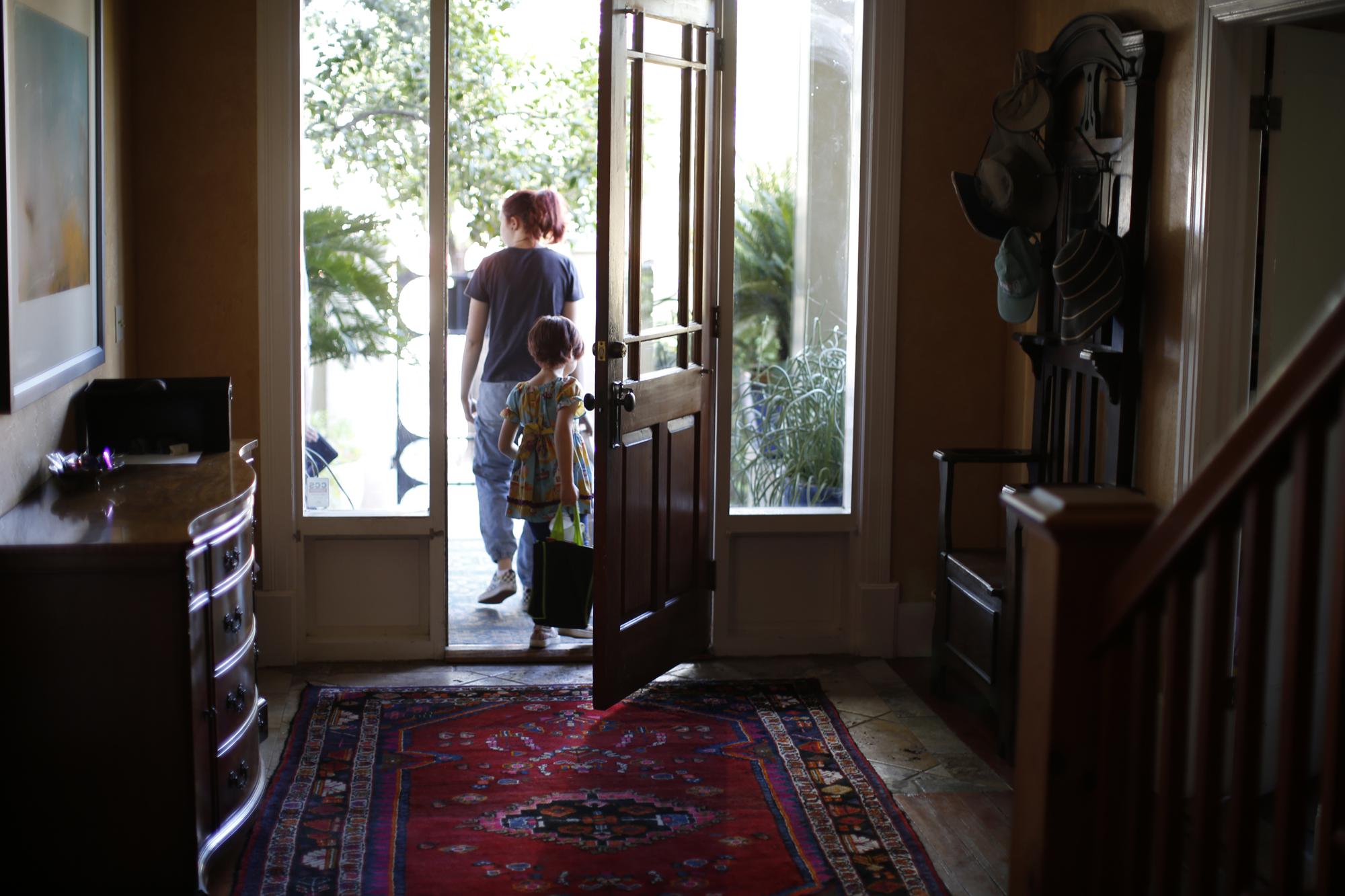 MJ’s younger sister leaves the home of the attorney representing her in a lawsuit against The Church of Jesus Christ of Latter-day Saints., in Tucson, Ariz., Oct. 30, 2021. (AP Photo/Dario Lopez-Mills)