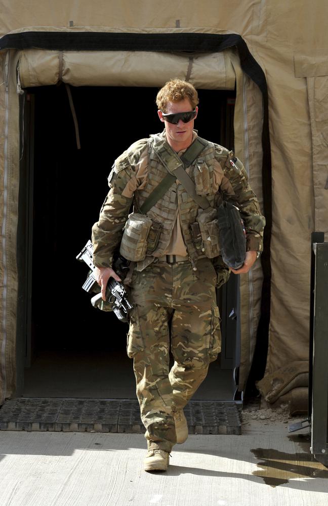FILE Britain's Prince Harry or just plain Captain Wales as he is known in the British Army, at the British controlled flight-line in Camp Bastion southern Afghanistan, Oct. 31, 2012. Prince Harry alleges in a much-anticipated new memoir that his brother Prince William lashed out and physically attacked him during a furious argument over the brothers’ deteriorating relationship. The book “Spare" also included incendiary revelations about the estranged royal’s drug-taking, first sexual encounter and role in killing people during his military service in Afghanistan, (John Stillwell, Pool Photo via AP, File)