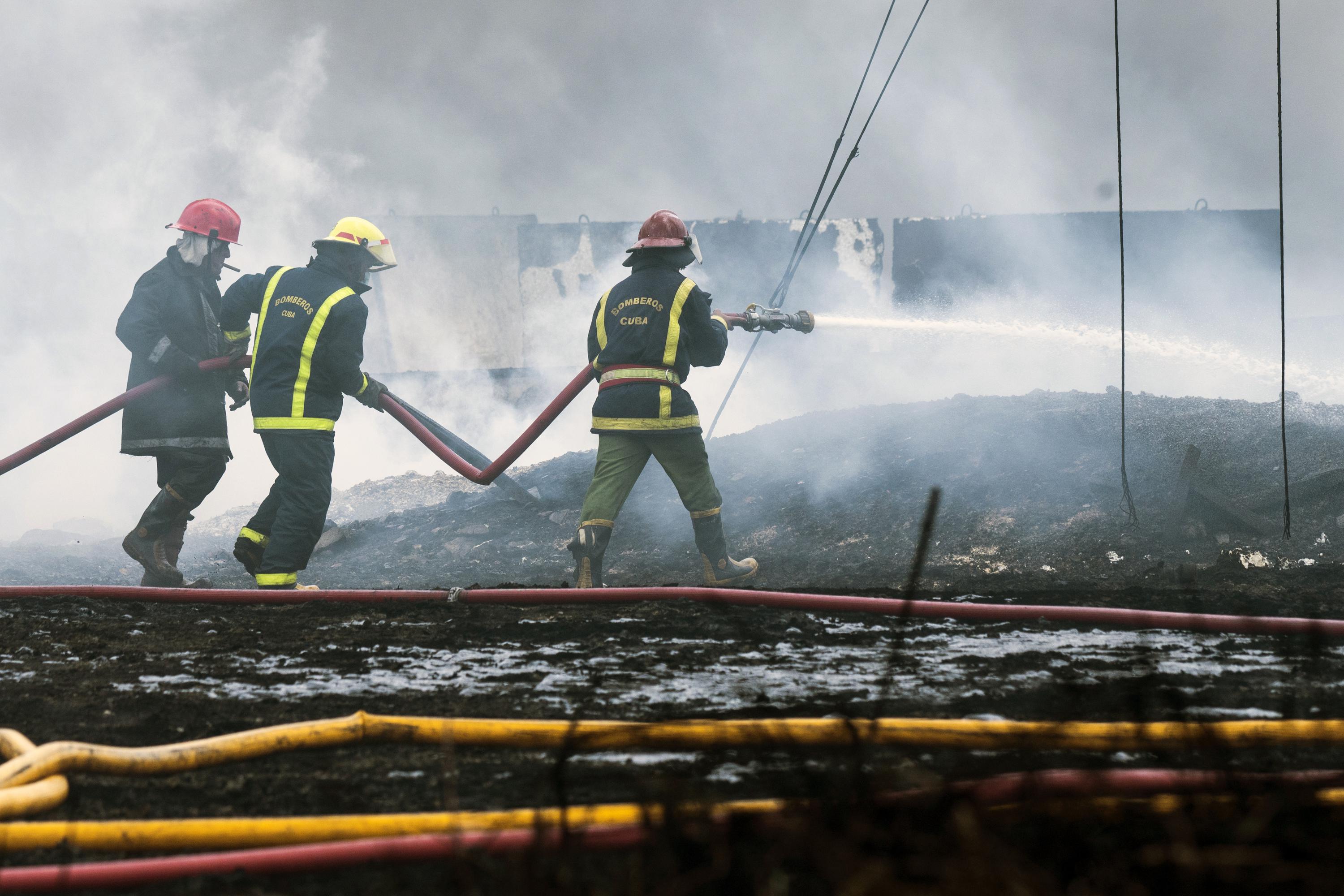 Firefighters subdue deadly blaze at key oil facility in Cuba AP News