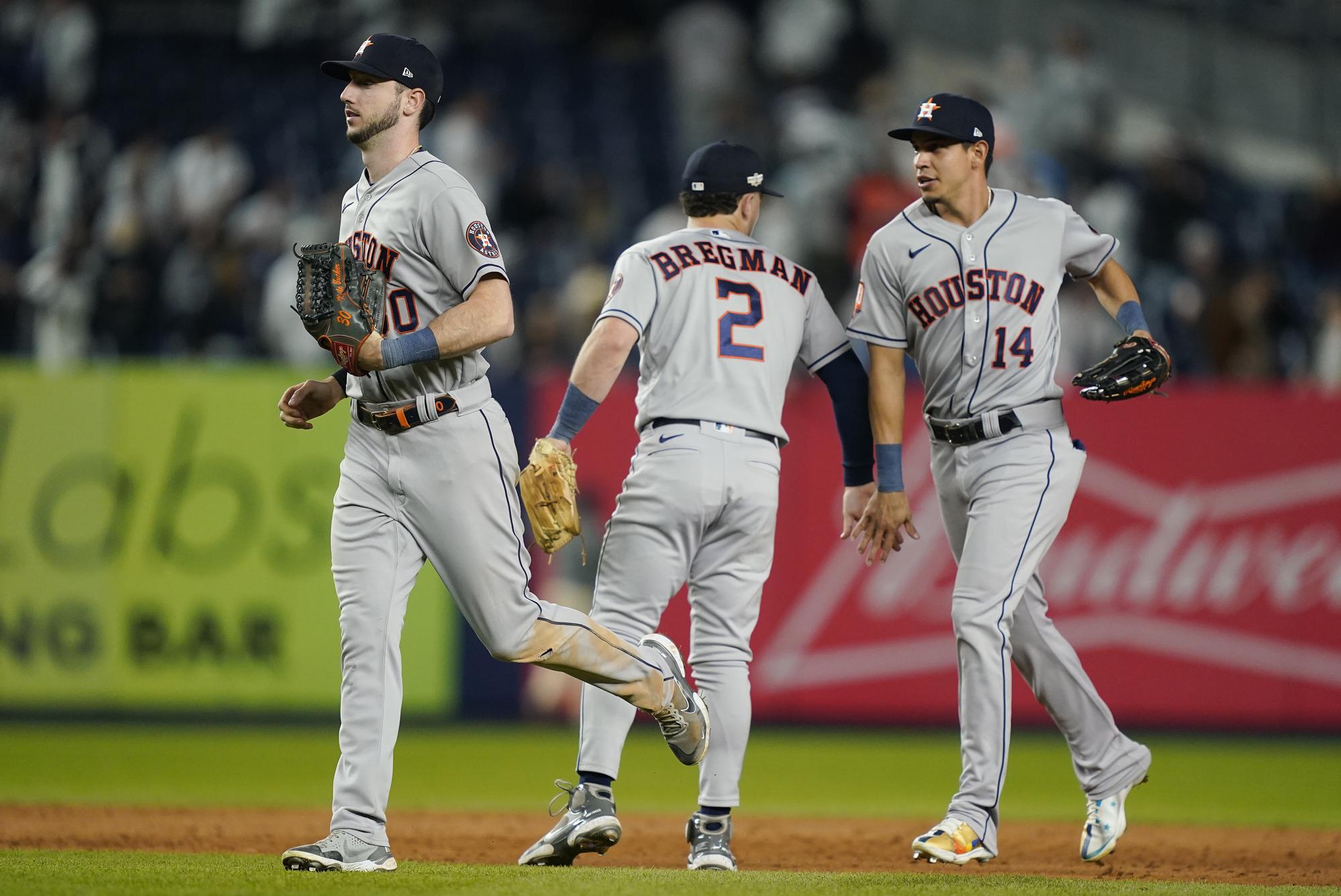 MLB Playoffs: Astros try to sweep Yanks, Phils lead Pads 3-1 | AP News