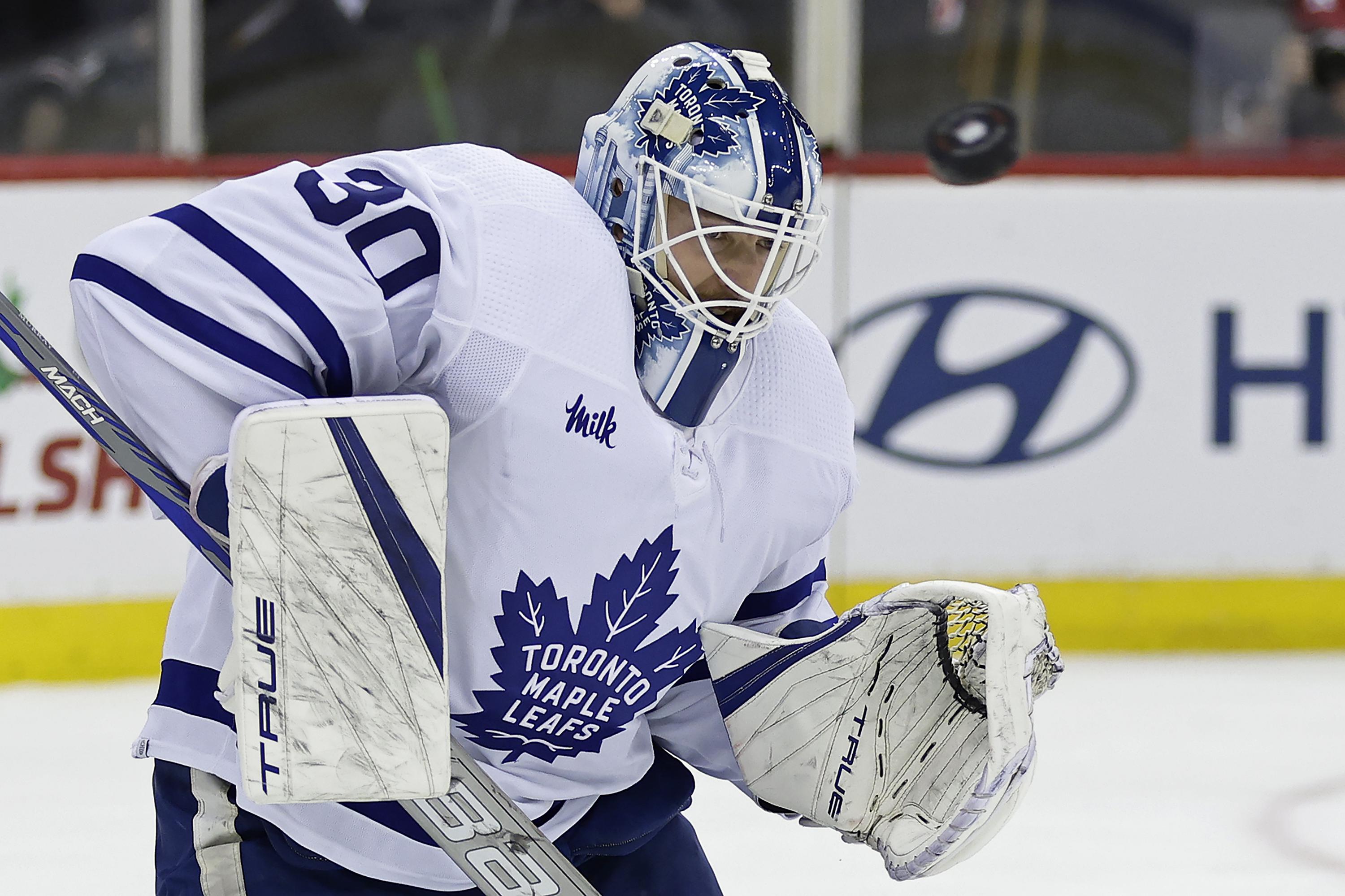 Devils' winning streak stopped at 13 in loss to Maple Leafs | AP News
