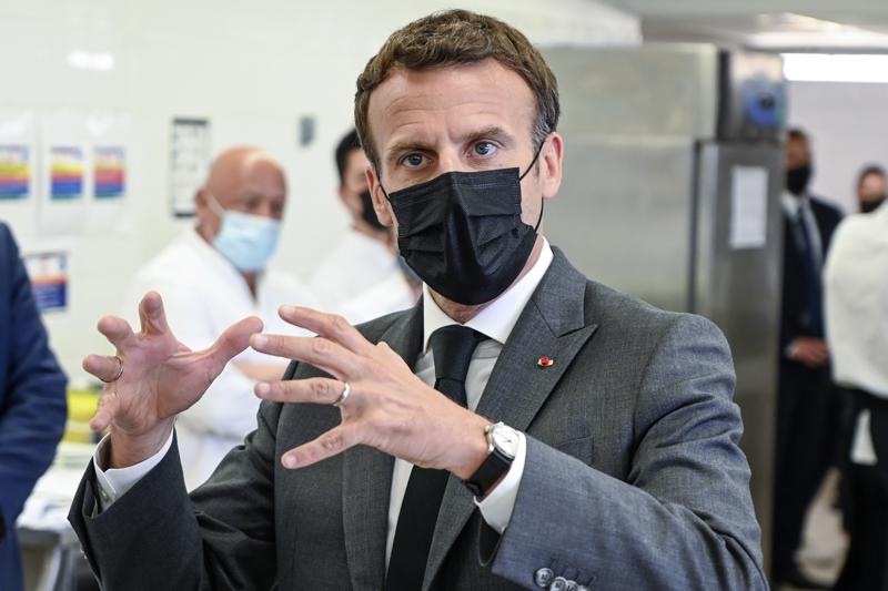 French leader Macron is slapped during visit to small town