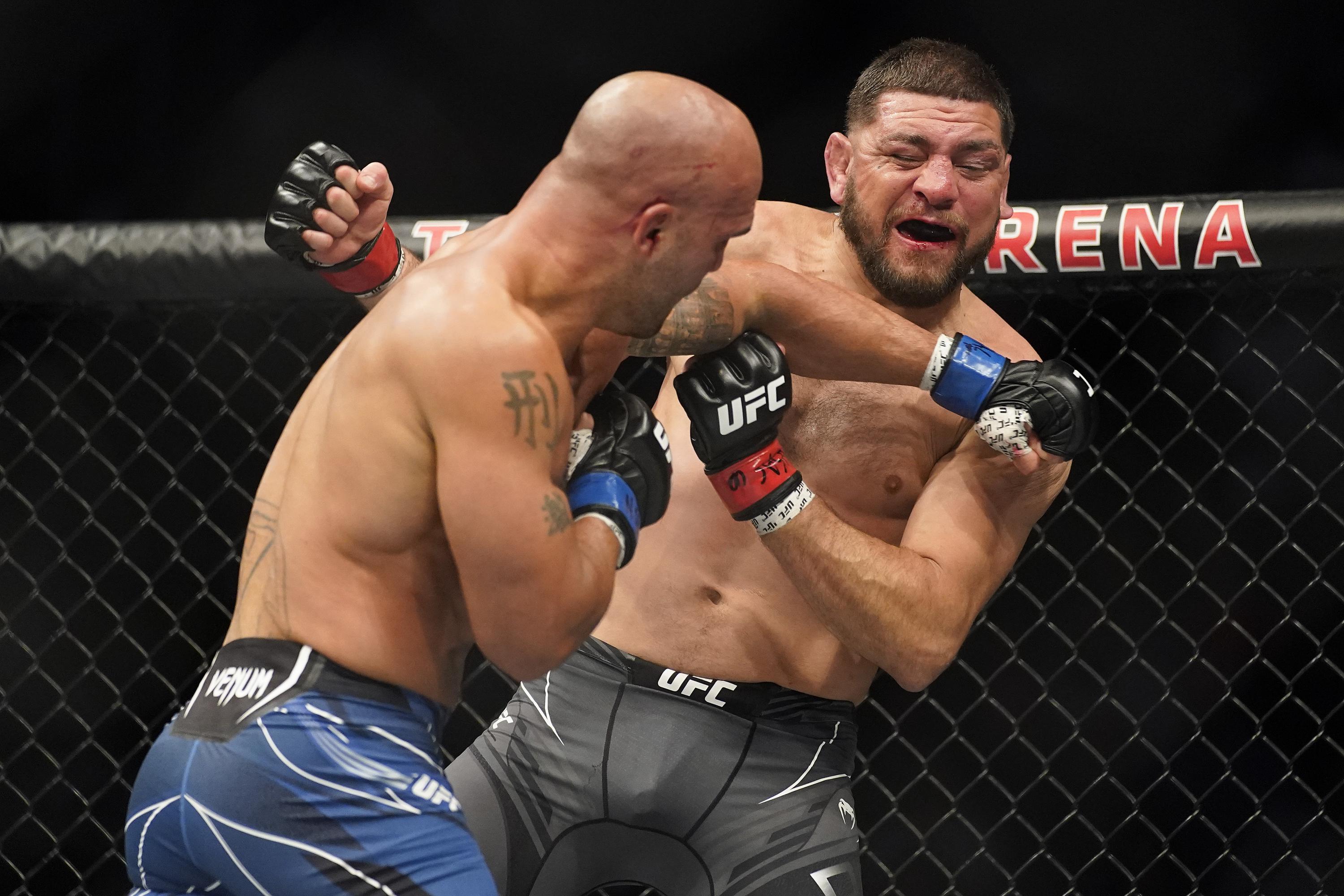 Volkanovski, Shevchenko defend at UFC 266; Lawler stops Diaz | AP News Volkanovski, Shevchenko defend at UFC 266; Lawler stops Diaz | AP News
