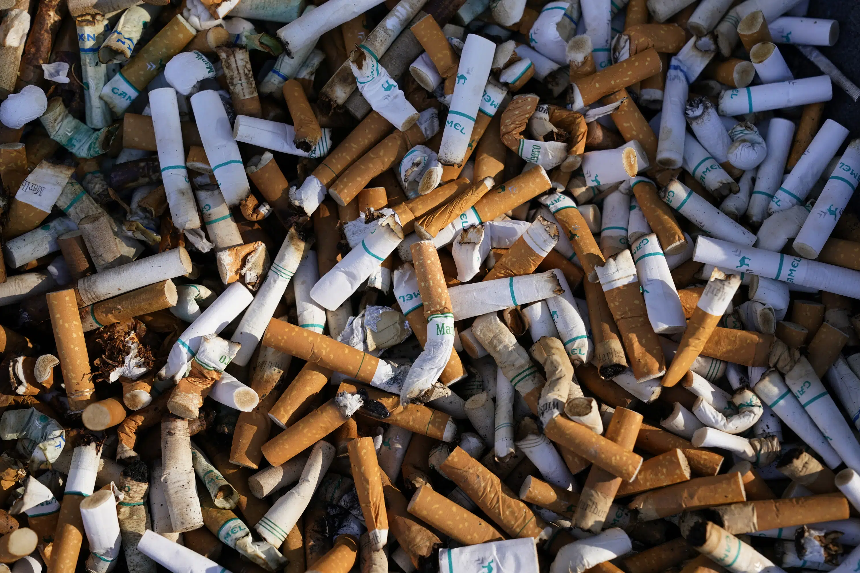 US adult cigarette smoking rate hits new all-time low - The Associated Press