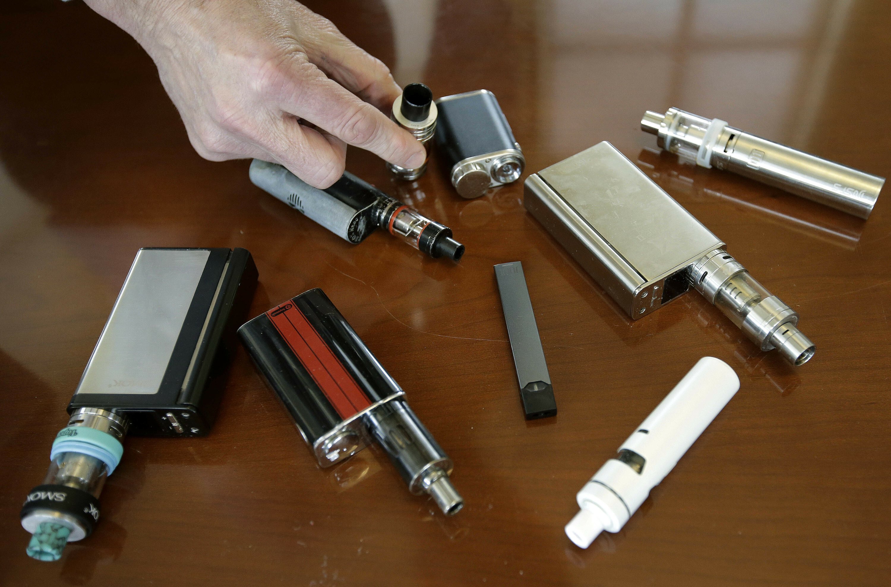 Vaping companies sue to delay US e-cigarette review Vaping companies sue to delay US e-cigarette review