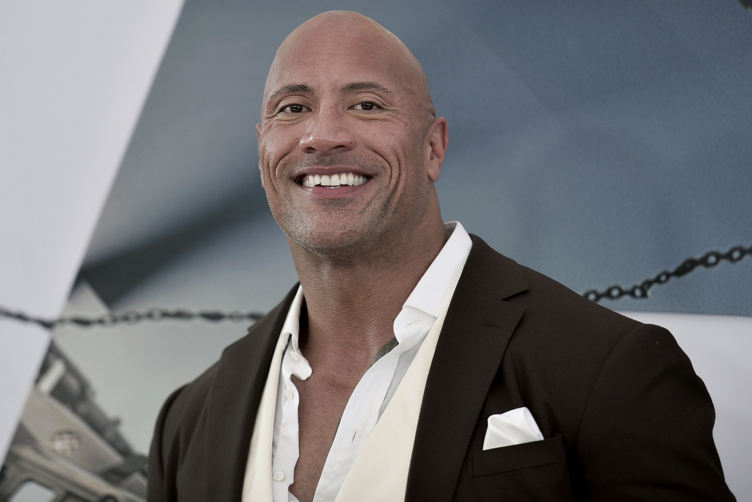 dwayne-the-rock-johnson-acquires-xfl-ap-news