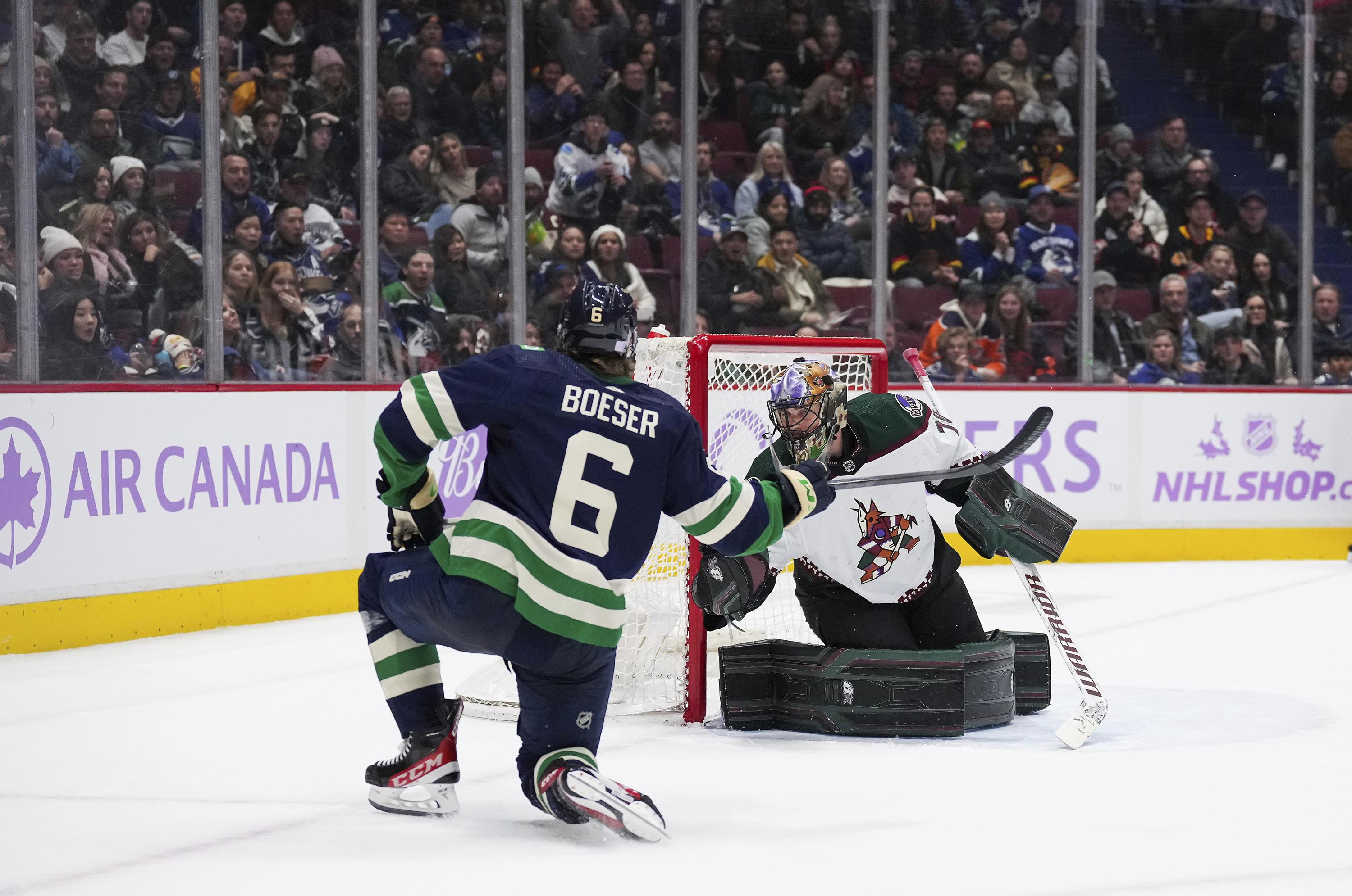 Horvat lifts Canucks past road-weary Coyotes 3-2 in OT | AP News