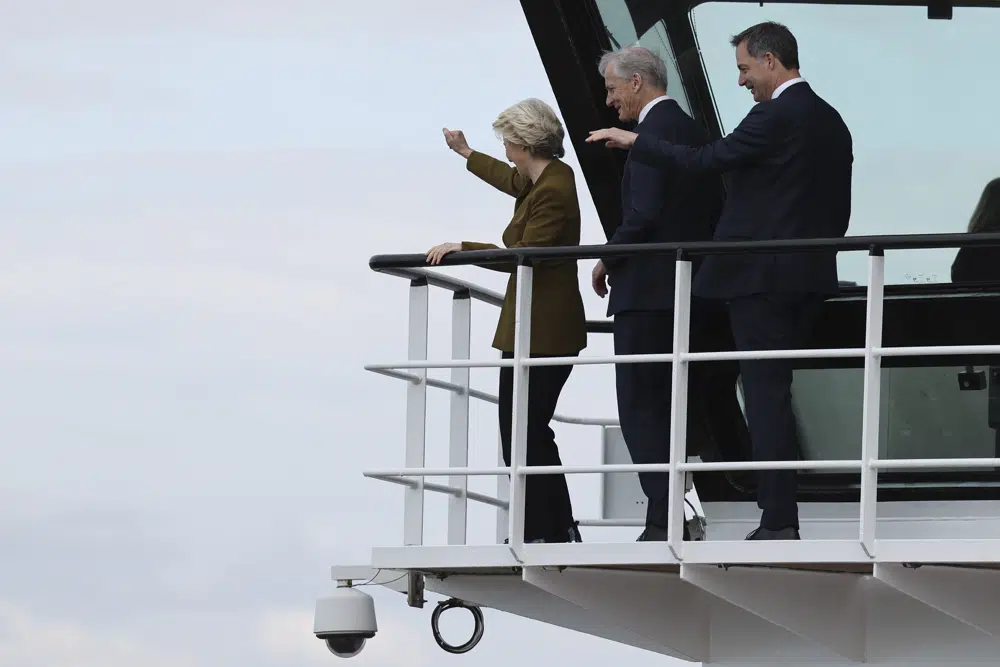 From left: European Commission President Ursula von der Leyen, Norway's Prime Minister Jonas Gahr Store and Belgium's Prime Minister Alexander De Croo wave during the North Sea Summit in Ostend, Belgium, Monday, April 24, 2023. Leaders gather on Monday in the hopes of expanding a collective ambition to harness the full energy and industrial potential of the North Sea and make it the largest powerhouse of Europe by 2050. (AP Photo/Geert Vanden Wijngaert)