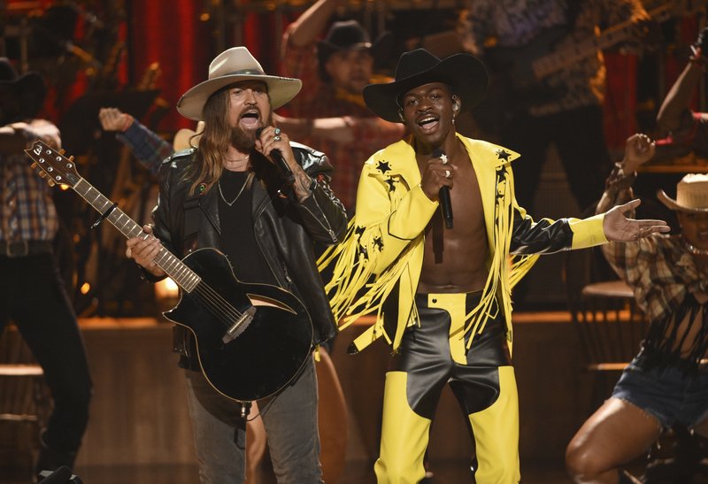 Billy Ray Cyrus, left, and Lil Nas X perform