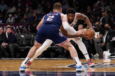 Short-handed Nets beat 76ers; Suns tie 