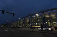 Shareholders arrive outside CHI Health Center Omaha for the Berkshire Hathaway annual meeting on Saturday, May 6, 2023, in Omaha, Neb. (AP Photo/Rebecca S. Gratz)