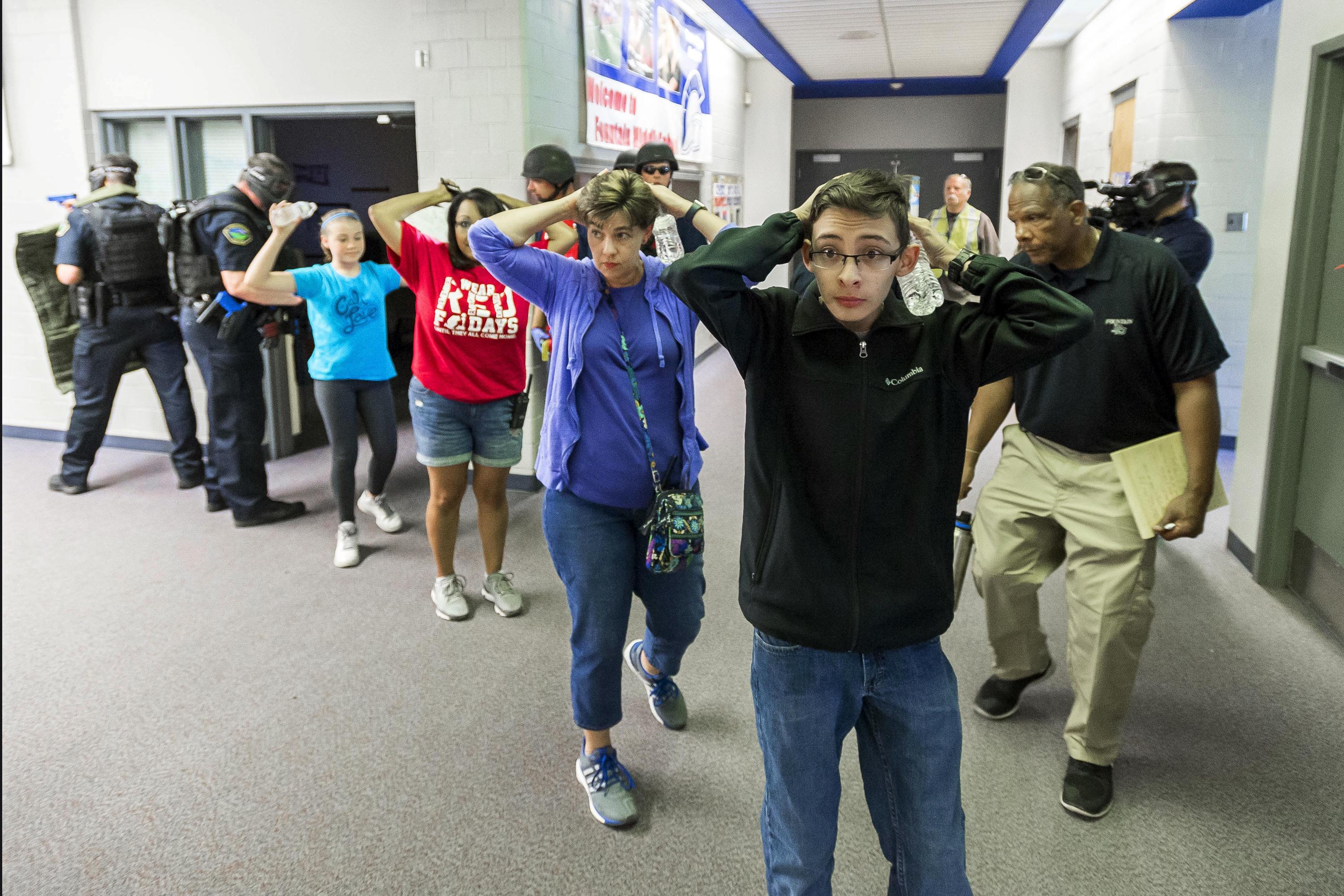 For 'lockdown generation' school shootings are their reality | AP News