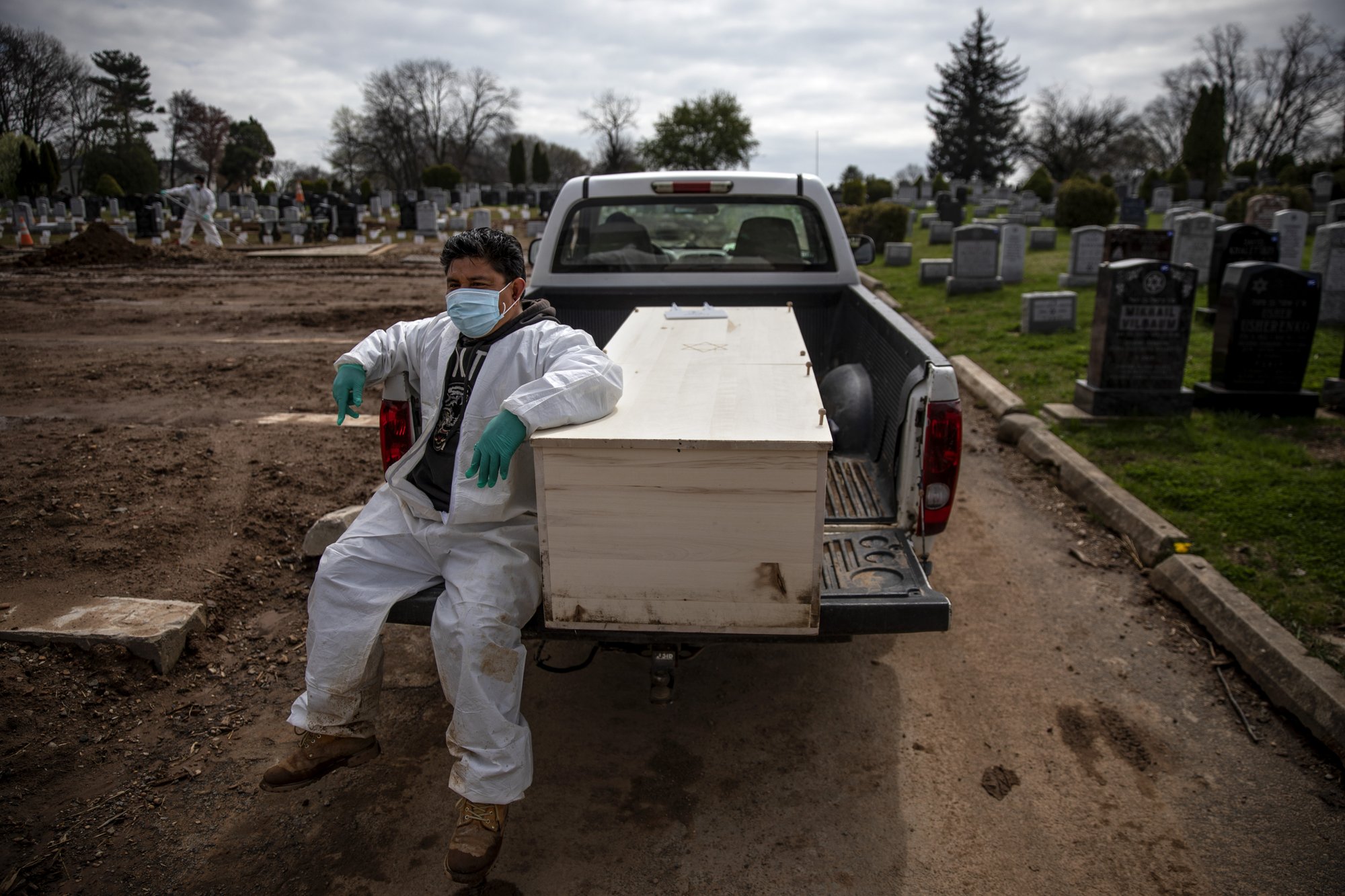 Cemetery races to keep up as New York virus deaths mount | AP News