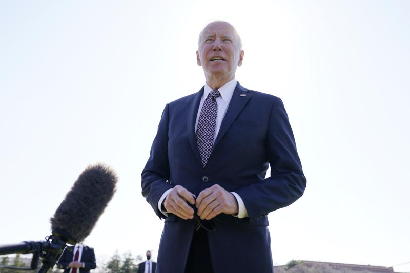 President Joe Biden speaks to the media at Fort Lesley J. McNair, Monday, April 4, 2022, as he returns to Washington and the White House after spending the weekend in Wilmington, Del. (AP Photo/Andrew Harnik)