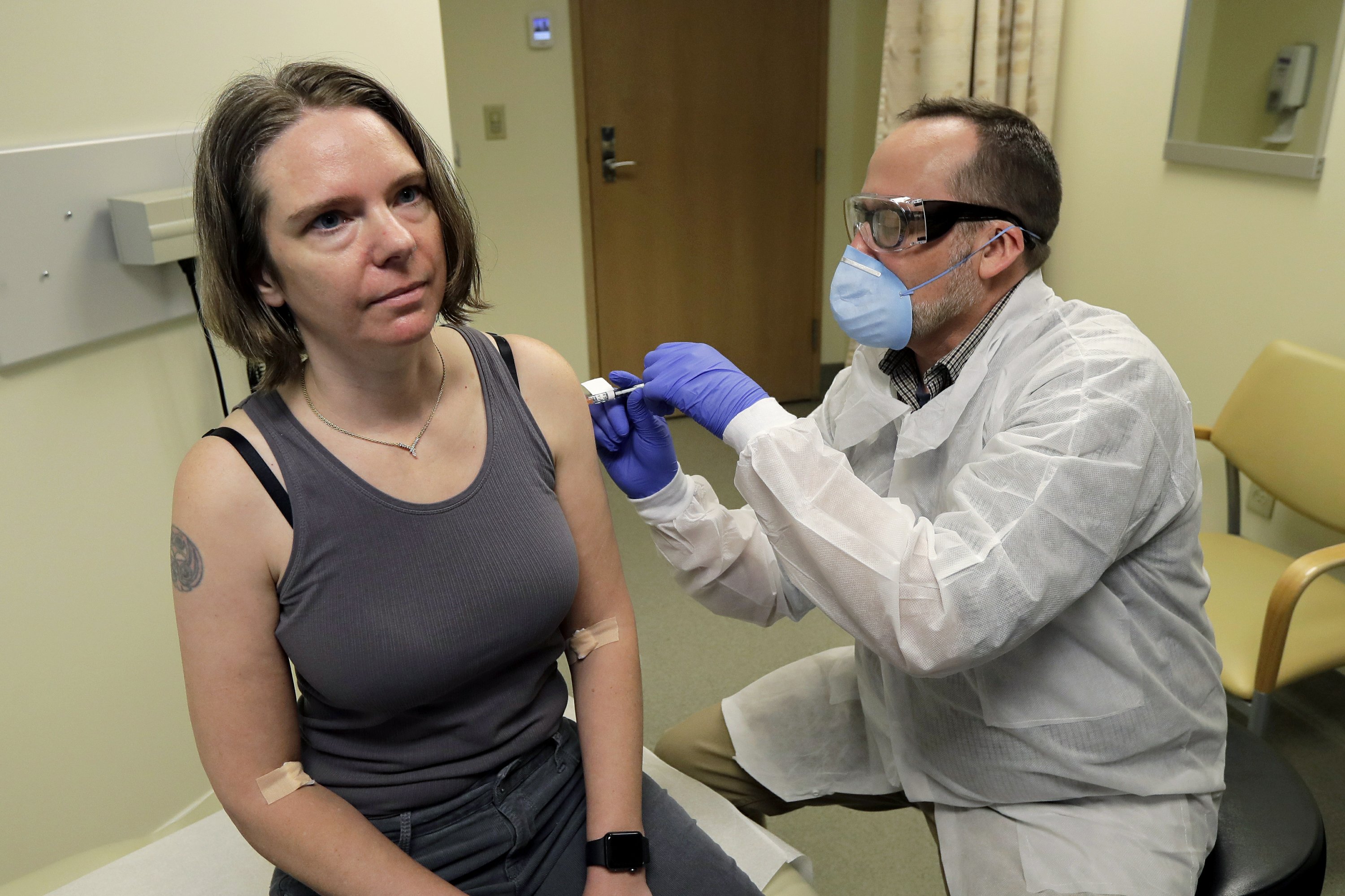 EXPLAINER: Should vaccine volunteers now get the real thing? - The Associated Press
