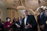 FILE - Senate Minority Leader Mitch McConnell, R-Ky., talks with reporters at the Capitol in Washington, April 5, 2022. (AP Photo/J. Scott Applewhite, file)