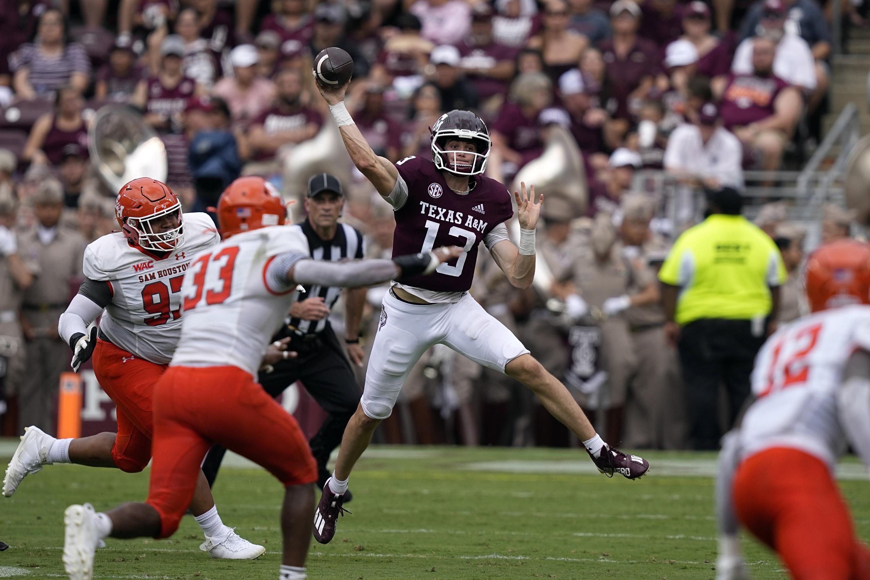King throws 3 TDs as No. 6 Texas A&M downs Sam Houston 310 AP News