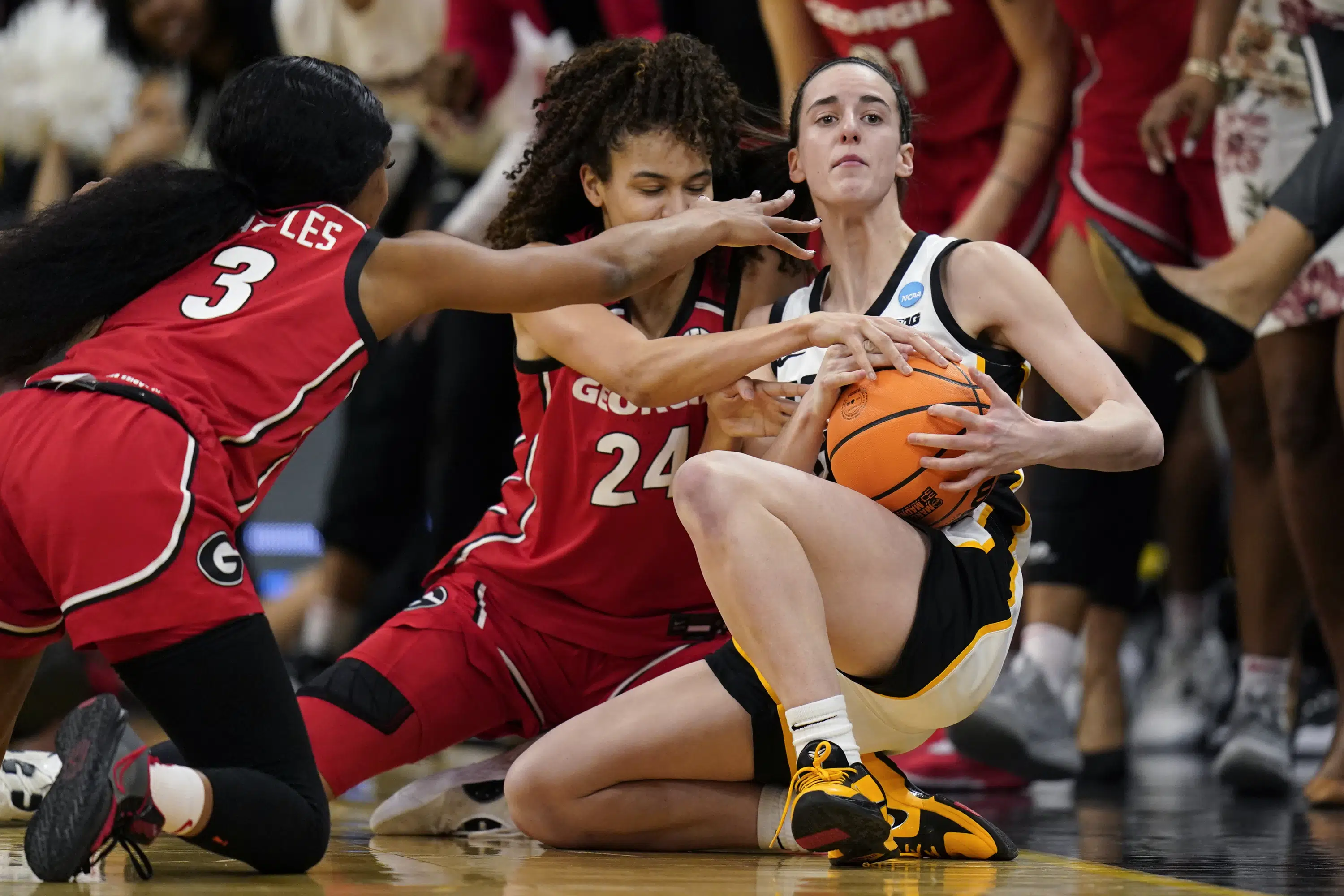 Clark, Czinano lead Iowa past Georgia in March Madness