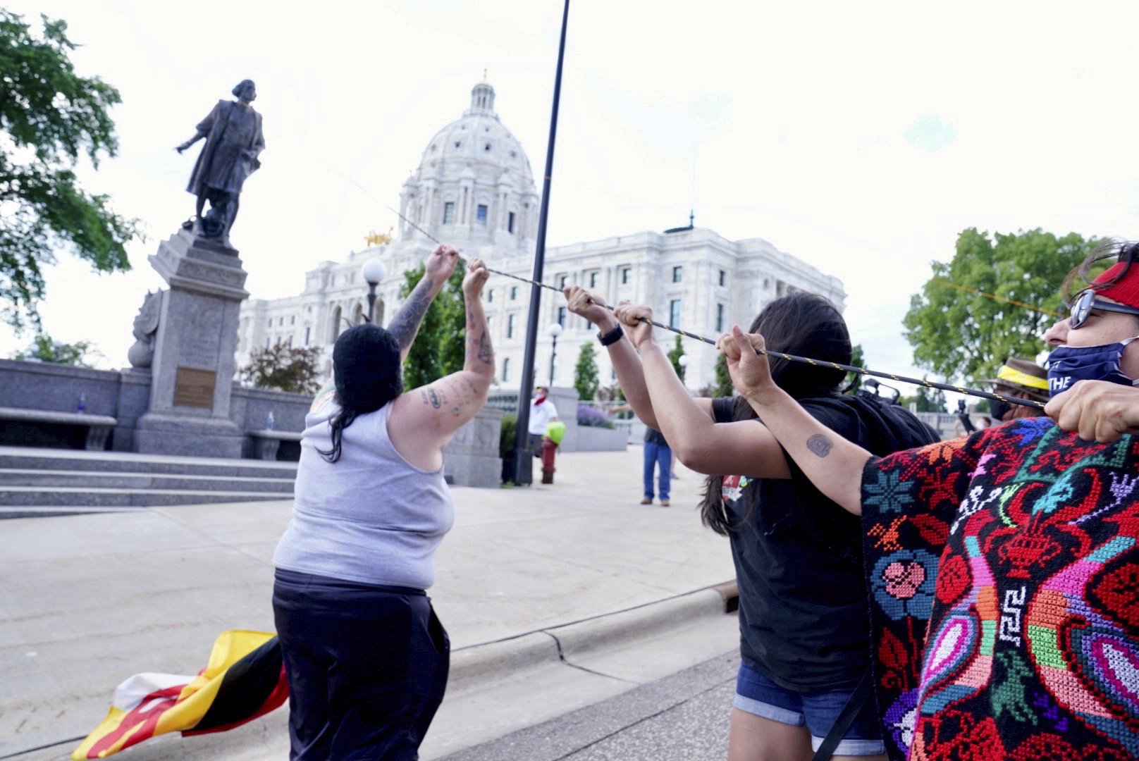 Minnesota protesters pull down Columbus statue at Capitol AP News