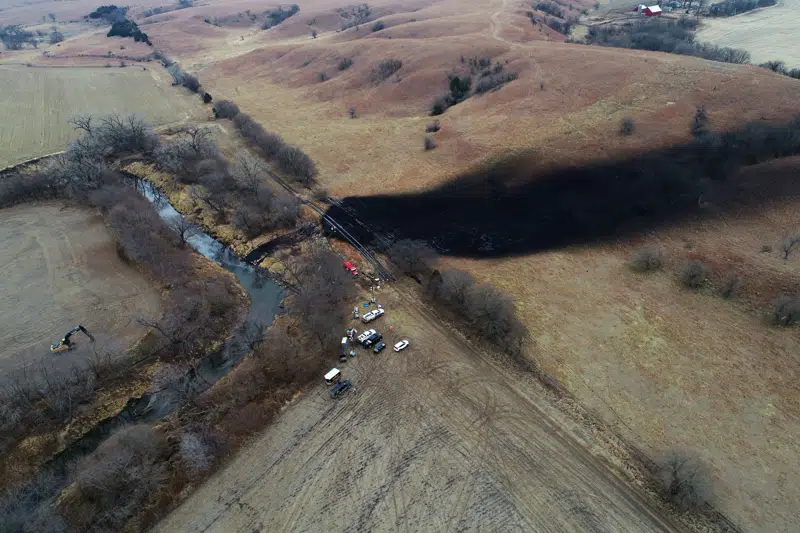 FILE - In this photo taken by a drone, cleanup continues in the area where the ruptured Keystone pipeline dumped oil into a creek in Washington County, Kan., on Dec. 9, 2022. A faulty weld at a bend in an oil pipeline contributed to a spill that dumped nearly 13,000 bathtubs' worth of crude oil into a northeastern Kansas creek, the pipeline's operator said Thursday, Feb. 9, 2023, estimating the cost of cleaning it up at $480 million. (DroneBase via AP, File)