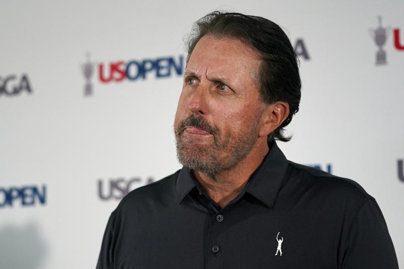 Phil Mickelson ponders a question at a press conference, Monday, June 13, 2022, at The Country Club in Brookline, Mass., ahead of the U.S. Open golf tournament. (AP Photo/Robert F. Bukaty)