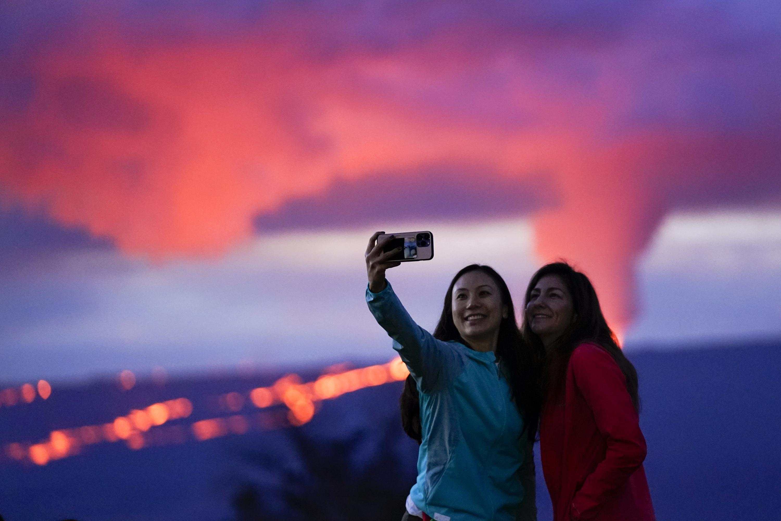 Viewers flock to watch glowing lava ooze from the Hawaii volcano