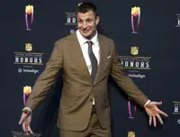 FILE - Rob Gronkowski arrives for the NFL Honors in Inglewood, Calif., on Feb. 10, 2022. The four-time Super Bowl winner will host a music festival called “Gronk Beach” in Phoenix on Saturday, Feb. 11, 2023, a day ahead of the Super Bowl. (AP Photo/Marcio Jose Sanchez, File)