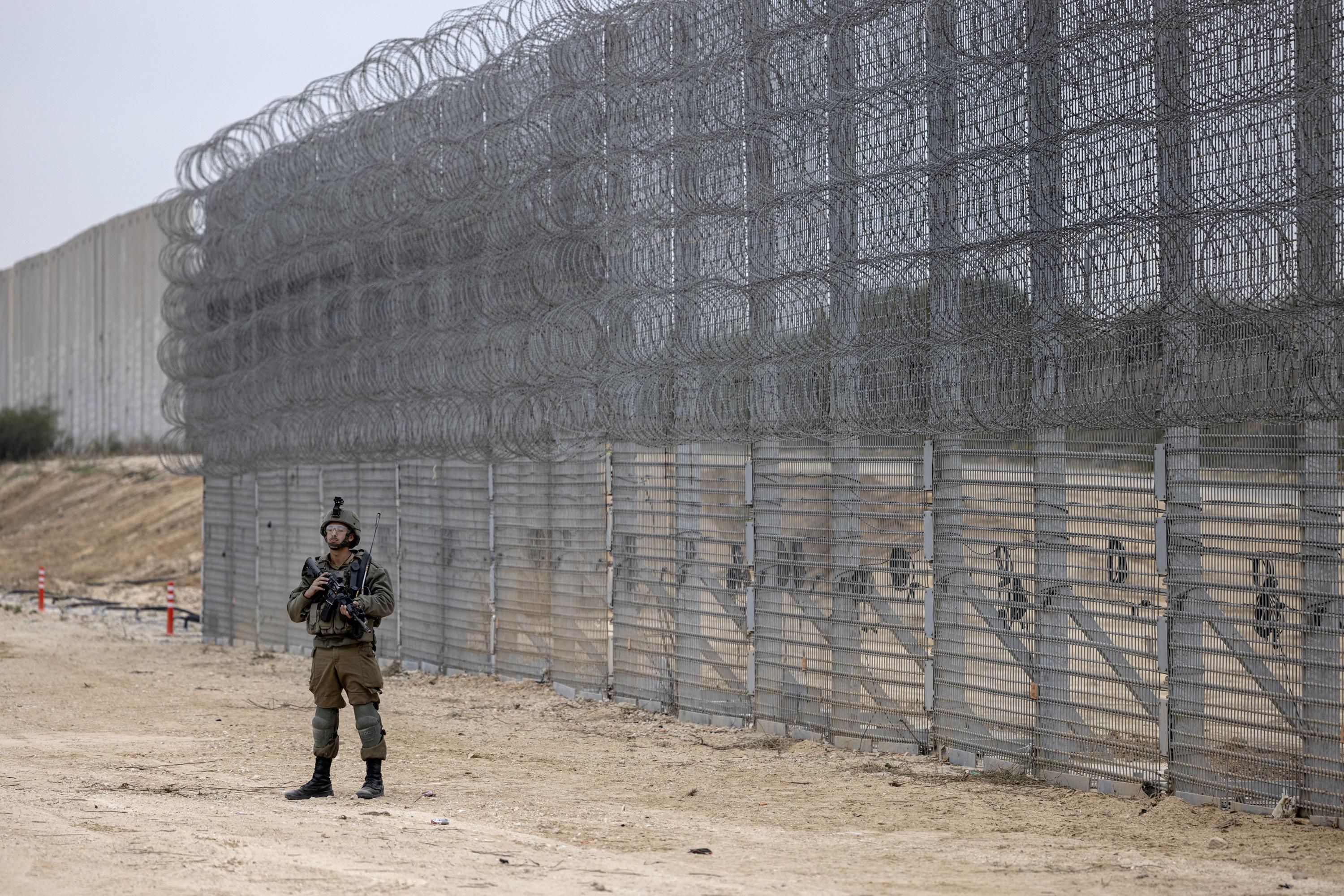 Israel announces completion of security barrier around Gaza AP News