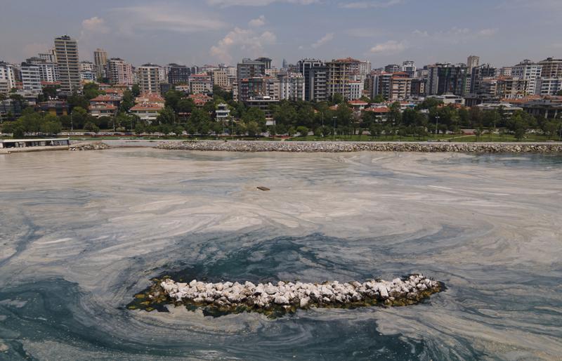 A view of the sea, on the Caddebostan shore, on the Asian side of Istanbul, Monday, June 7, 2021. Turkey's parliament agreed on Thursday, June 10, 2021, to set up an all-party committee to investigate a mass of sea mucilage that is threatening marine life in the Sea of Marmara. The so-called "sea snot" _ a thick, slimy substance made up of compounds released by marine organisms has surfaced in the sea south of Istanbul, alarming marine biologists and environmentalists. (AP Photo/Kemal Aslan)