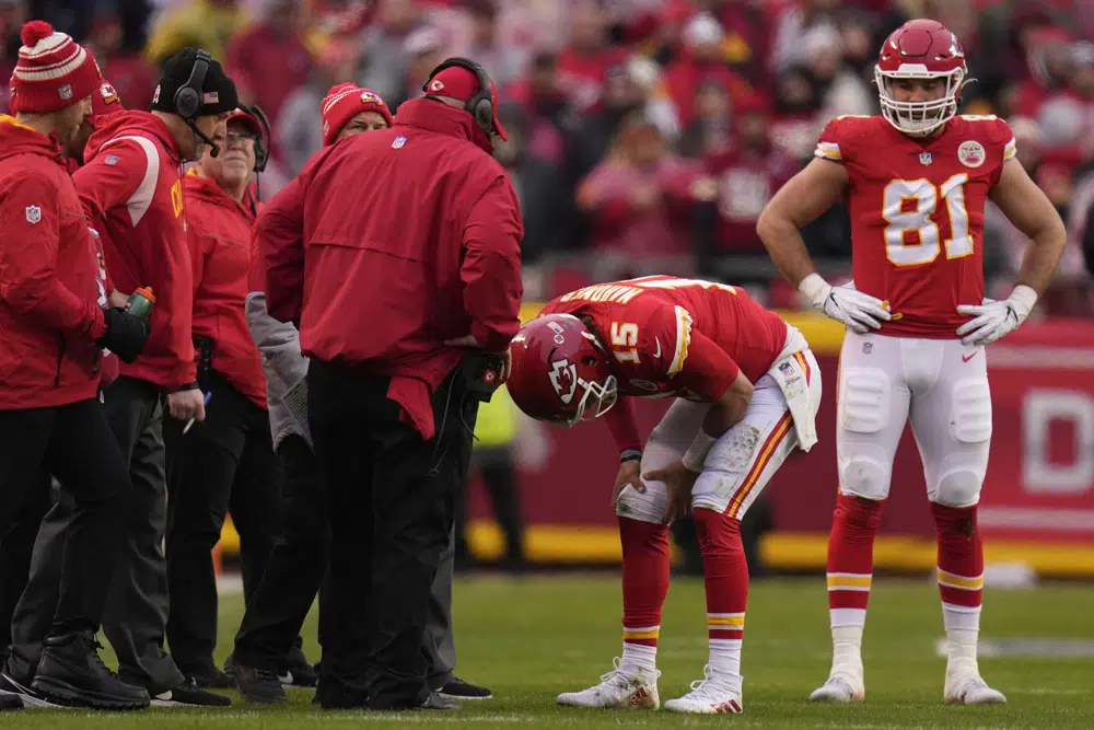 Kansas City Chiefs quarterback Chad Henne (4) passes the ball in pregame  warmups during the AFC Championship, Sunday, Jan 19, 2020, in Kansas City,  Mo. The Chiefs beat the Titans 35-24. (Photo