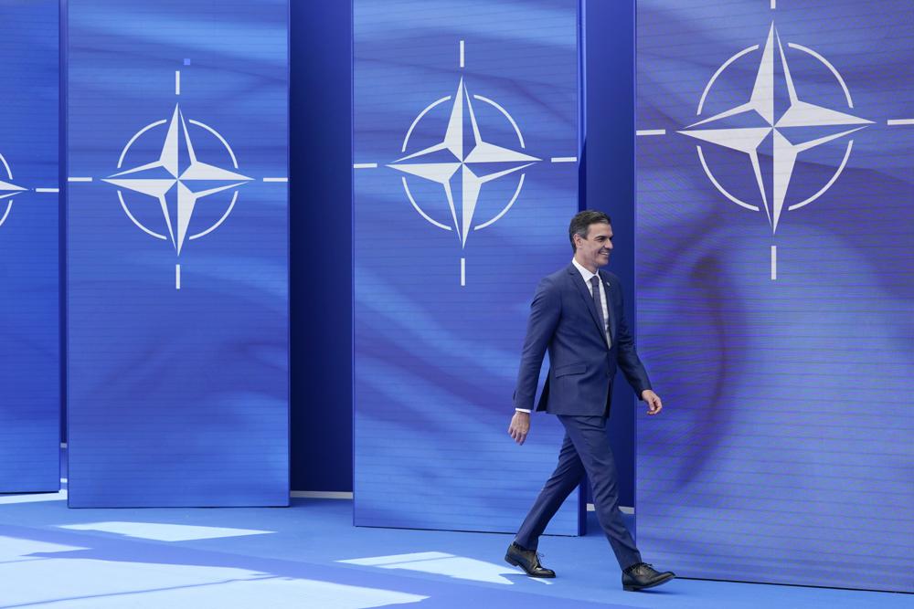 Spain's Prime Minister Pedro Sanchez arrives to pose for photos with NATO Secretary General Jens Stoltenberg at the NATO summit at NATO headquarters in Brussels, Monday, June 14, 2021. Russia’s invasion of Ukraine is certain to dominate an upcoming NATO summit in Madrid. But host nation Spain and other members are quietly pushing the Western alliance to consider how mercenaries aligned with Russian President Vladimir Putin are spreading Moscow’s influence in Africa. (AP Photo/Patrick Semansky, Pool, File)