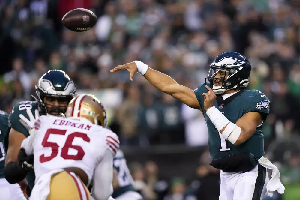 Philadelphia Eagles quarterback Jalen Hurts passes during the second half of the NFC Championship NFL football game between the Philadelphia Eagles and the San Francisco 49ers on Sunday, Jan. 29, 2023, in Philadelphia. (AP Photo/Matt Rourke)