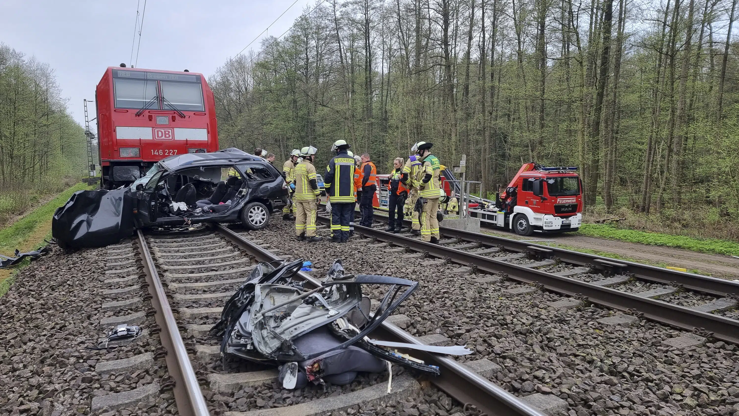 Train hits car at crossing in Germany, 3 killed