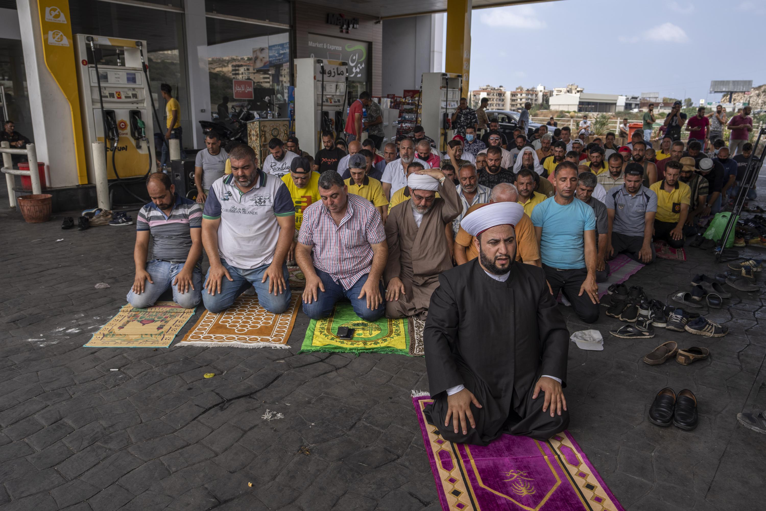 Worshippers pray at gas station in Lebanon amid fuel crisis AP News