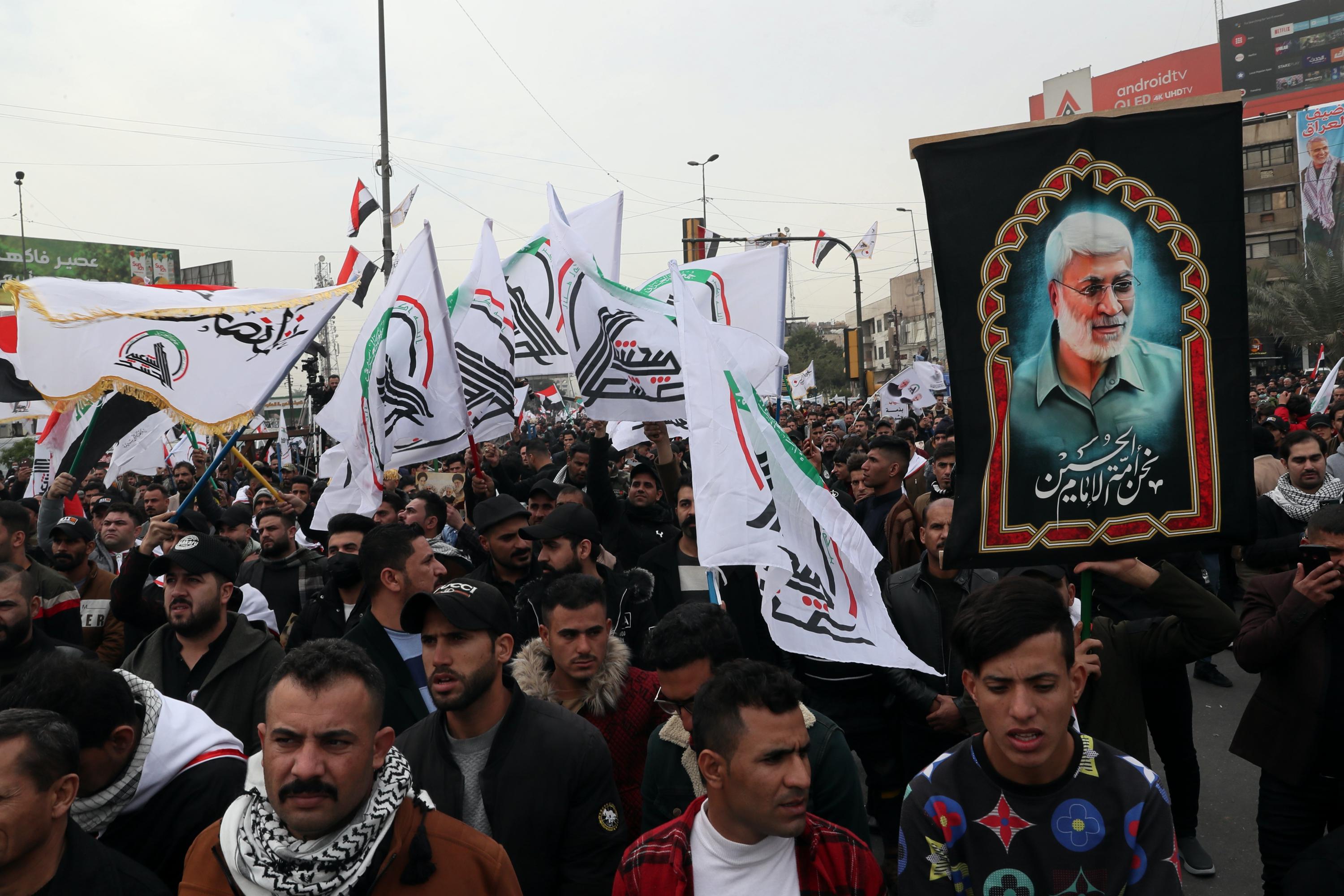 Rally in Baghdad on anniversary of Iranian general's death | AP News