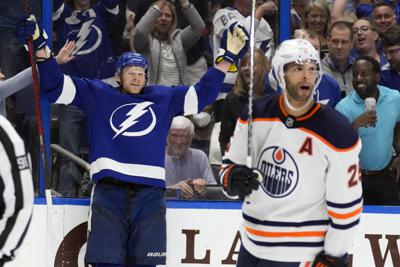 Perry gets 400th goal, Lightning beat Oilers 5-3 | AP News