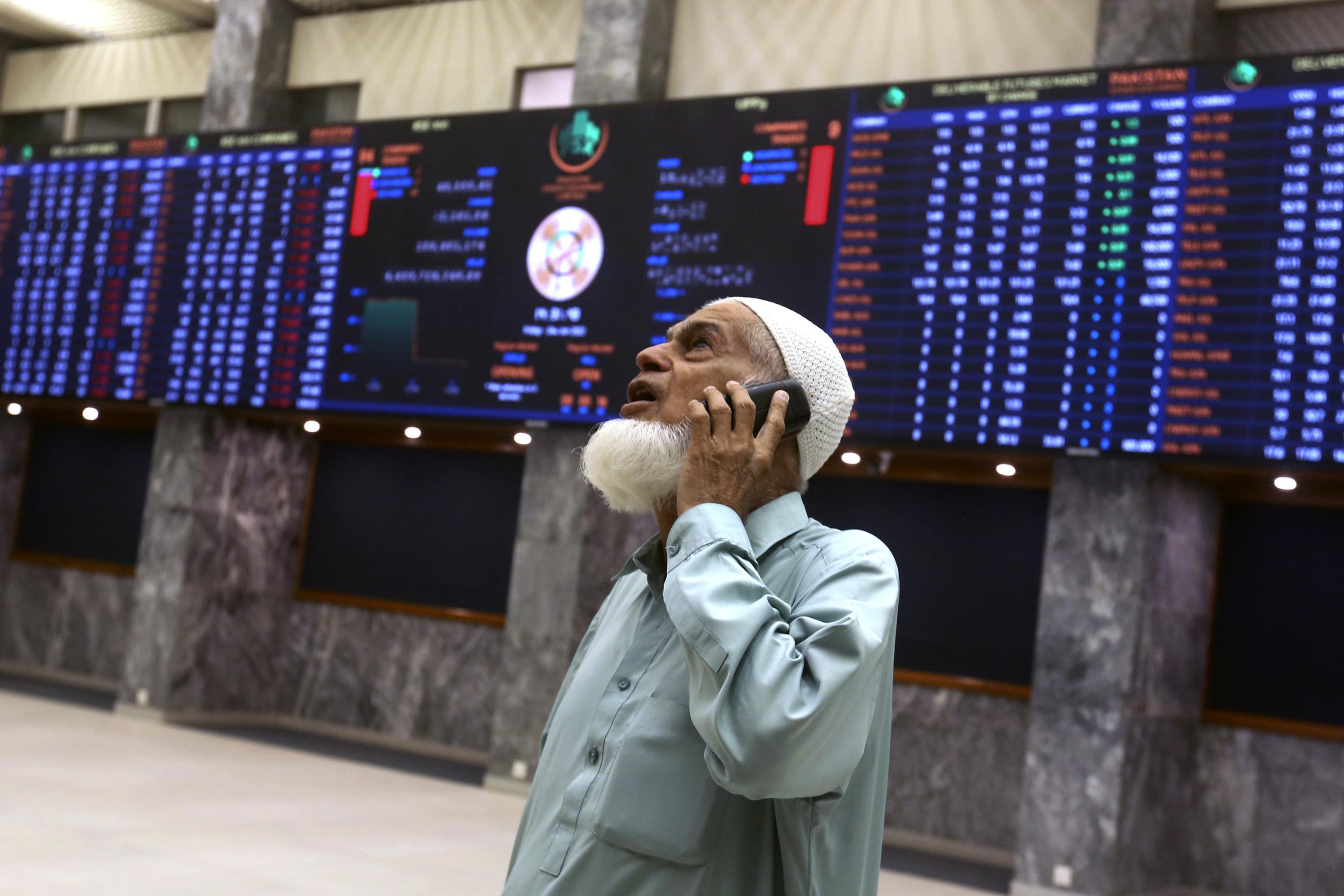 Pakistan stock market plunges on new govt tax on industries AP News