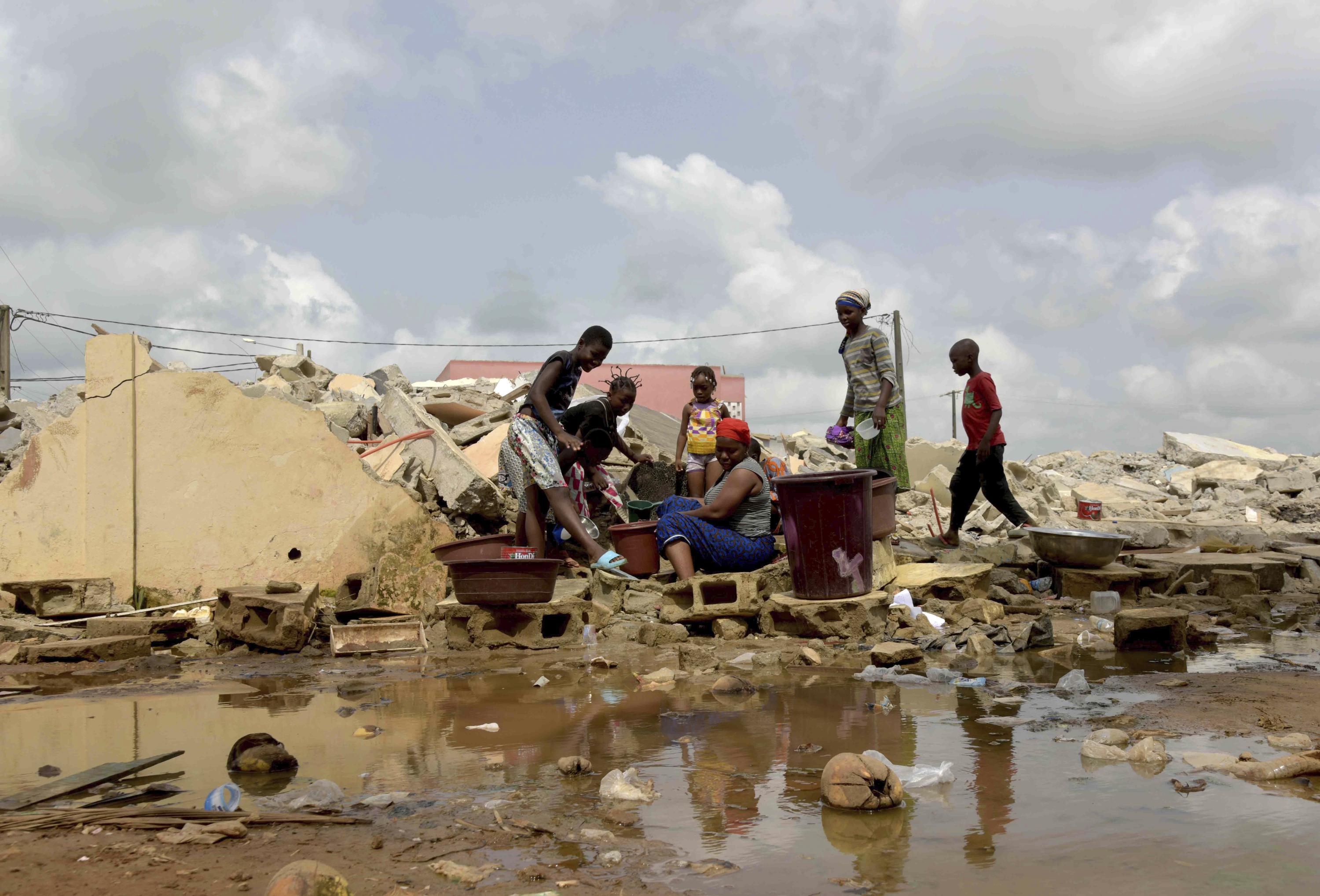 
                            Homes are demolished in Ivory Coast's main city over alleged health concerns. Thousands are homeless