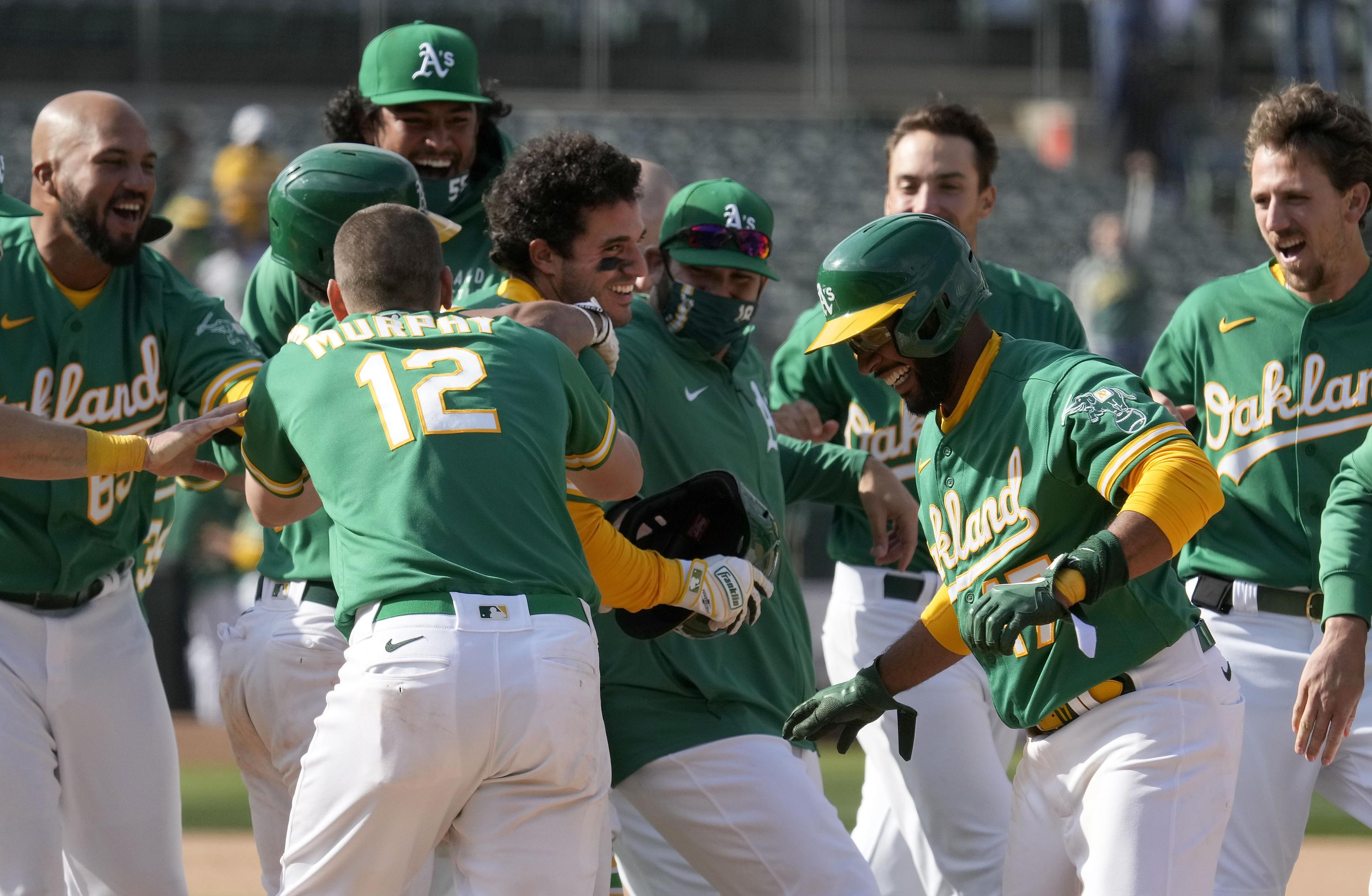 A's extend winning streak to 11, helped by 2 errors in 10th - Vimarsana News