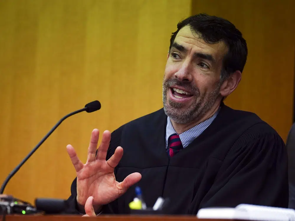 FILE - Fulton County Superior Court Judge Robert McBurney speaks during a hearing to decide if the final report by a special grand jury looking into possible interference in the 2020 presidential election can be released Jan. 24, 2023, in Atlanta. Lawyers for former President Donald Trump on Monday, March 20, 2023 filed a motion seeking to throw out the special grand jury investigation and disqualify Fulton County District Attorney Fani Willis, saying McBurney misinterpreted state law. (AP Photo/John Bazemore, File)