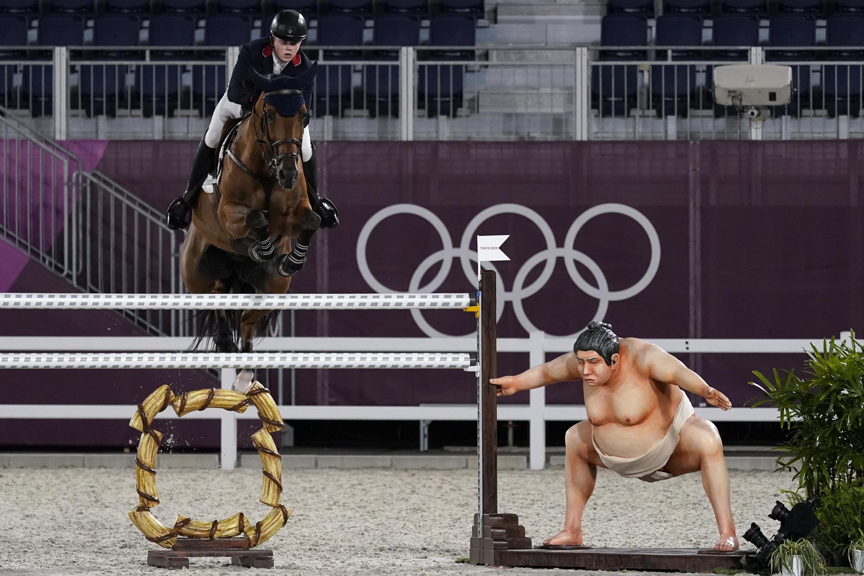 Sumo removed, but equestrian course designer defends choice AP News