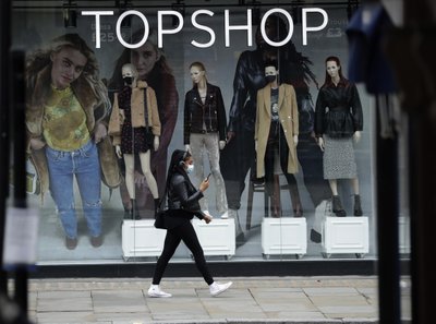 UK online fashion retailer buys Topshop, three other brands | AP News