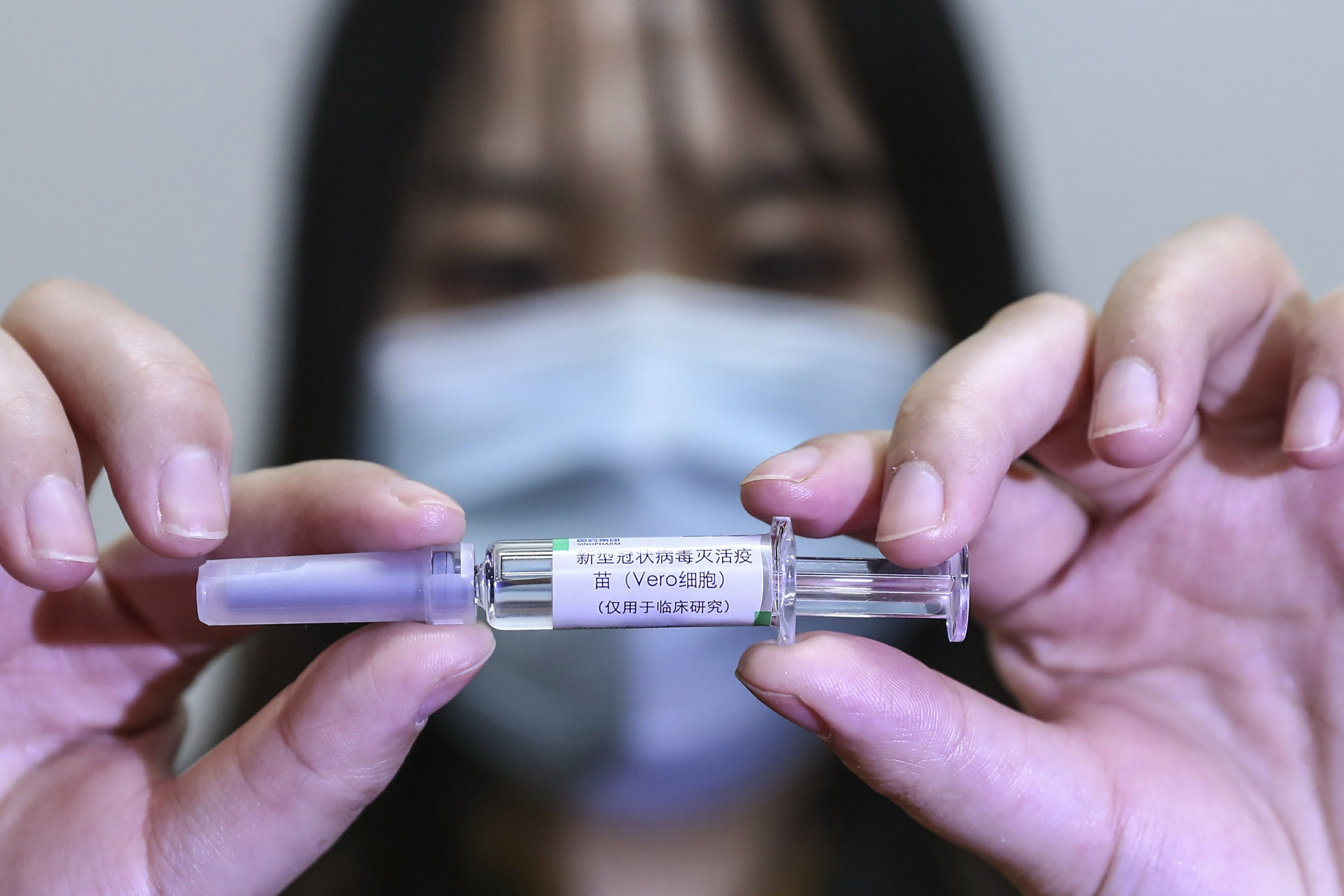 Chinese executives get 'pre-test' injections in vaccine race