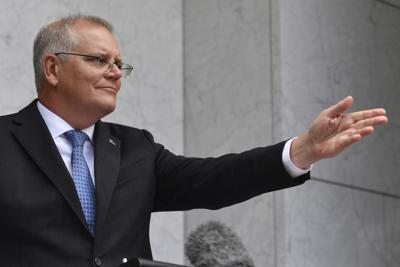 El primer ministro de Australia, Scott Morrison, habla con los medios durante una conferencia de prensa en Canberra, el lunes 7 de febrero de 2022. (Mick Tsikas/AAP Image via AP)