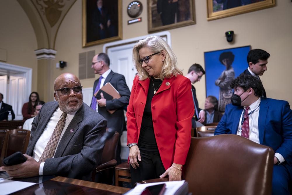 Chairman Bennie Thompson, D-Miss., left, and Vice Chair Liz Cheney, R-Wyo., of the House Select Committee investigating the Jan. 6 U.S. Capitol insurrection, arrive to testify before the House Rules Committee seeking contempt of Congress charges against former President Donald Trump advisers Peter Navarro and Dan Scavino in response to their refusal to comply with subpoenas, at the Capitol in Washington, Monday, April 4, 2022. (AP Photo/J. Scott Applewhite)